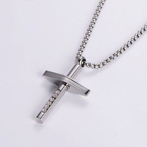 Silver hip hop necklace with iced out cross pendant and braided metal chain link