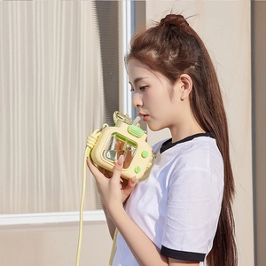 Kid carrying a creative yellow camera-shaped water bottle with a convenient shoulder strap