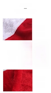 Close-up of plush red Christmas hat with thick white faux fur brim and pompom texture