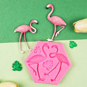 Pink flamingo and monstera leaf silicone mold for chocolate and fondant cake decoration