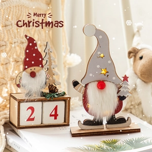 Wooden Christmas countdown calendar with Santa ornaments and glowing star lighting decor