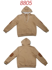 Detail view of khaki hooded sweatshirt showing textured jacquard fabric and elbow patches