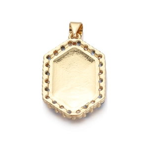 Macro shot of gold-plated hexagonal pendant back with beaded edges and polished finish