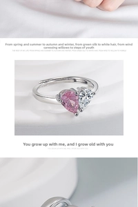 Detail of pink and white pear-cut stones in heart-shaped setting on adjustable silver ring