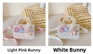 Detail of pink and white tweed girls bags with pearl handles and cute plush rabbits