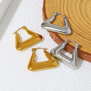 Minimalist geometric triangle earrings in polished 18K gold and silver stainless steel