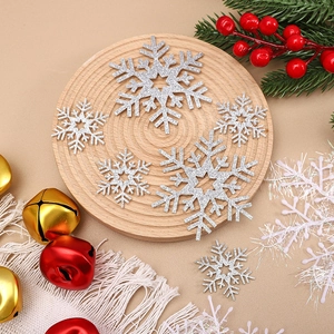 Sparkling silver snowflake ornaments with glitter on wooden base for Christmas decor