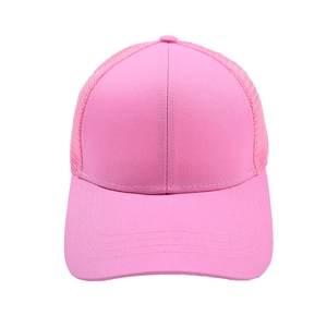 Detail of a bright pink ponytail baseball cap with breathable mesh and sturdy stitched brim