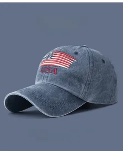 Detailed view of USA flag embroidery on vintage washed cotton denim baseball cap