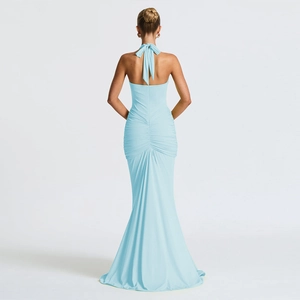 Elegant light blue halter neck evening gown with open back and mermaid style floor-length tail