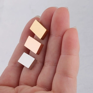 Close-up of DIY rectangle beads in gold, rose gold, and silver stainless steel