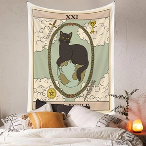 Detail view of the black cat Tarot 'The World' tapestry hanging on a bedroom wall