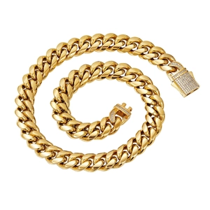 Mens gold Cuban link chain necklace with micro paved zircon buckle on white background