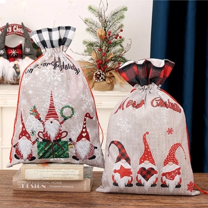 Christmas gnome drawstring gift bag in linen with festive red plaid and Merry Christmas print