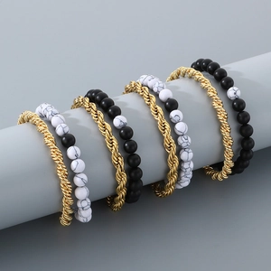 Men's set of 6 bead bracelets featuring gold twist chains and matte black onyx beads