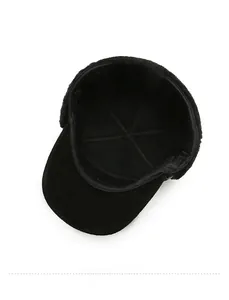 Detailed view of the warm winter baseball cap's plush lining and reinforced stitching