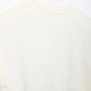 Close-up of beige knit vest back showing high-quality texture and round collar detail