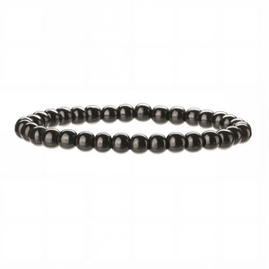 Bracelet en perles noires polies avec pierres rondes lisses et cordon élastique