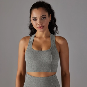 Grey seamless knit sports bra and leggings set with breathable texture for yoga and fitness