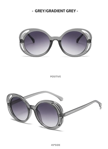 Macro view of grey oval sunglasses with gradient grey lenses in frontal and 45-degree angles