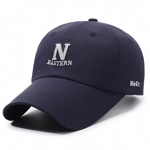 Classic navy cotton baseball cap featuring white N embroidery and broad reinforced brim