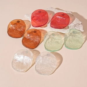 Irregular oval resin stud earrings in assorted colors with unique brushed texture finish