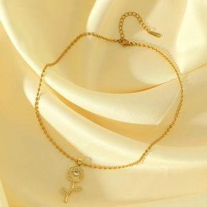 Golden stainless steel rose flower pendant necklace with zircon crystals on yellow silk