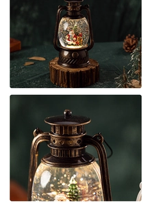 Detail of vintage bronze Christmas lantern with Santa scene and glowing snow globe