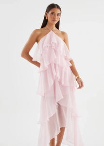 Detail of tiered chiffon ruffles on pink halter neck summer dress for beach vacation