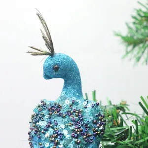 Décoration de Noël paon bleu avec paillettes, sequins et plumes pour sapin festif