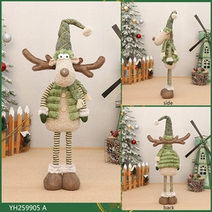 Front, side, and back views of a green telescopic Christmas reindeer doll decoration