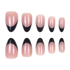 Unghie finte corte stile francese minimalista, base rosa nude e punte nere