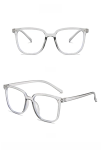 Double vue de lunettes carrées gris transparent montrant les angles face et 45 degrés