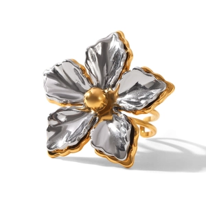 Two-tone stainless steel floral statement ring with textured hammered metal finish