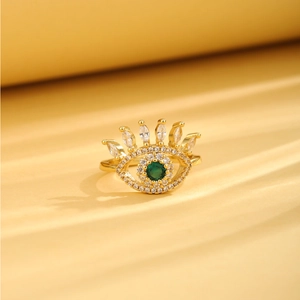 Gold-plated Evil Eye ring with green emerald-like zircon and white crystal crown accents