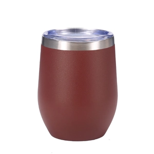 Detailed view of a 12oz matte burgundy stainless steel wine tumbler with a clear lid