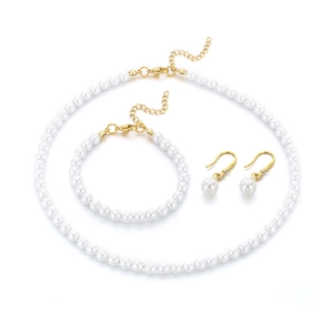 Elegant pearl jewelry set with necklace bracelet and crystal earrings on gold metal