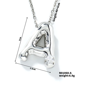 Macro view of silver letter A balloon pendant with zircon and dimensions 2cm x 1.6cm