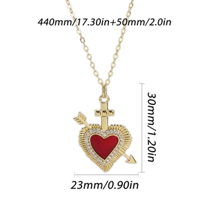 Detailed view of red heart pendant necklace with gold chain and dimension labels