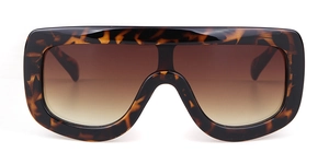 Detailed macro view of retro tortoiseshell aviator frames with gradient brown lenses