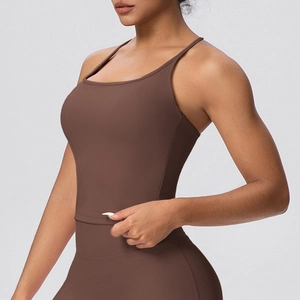 Detail of coffee brown racerback yoga vest with thin straps and elastic seamless fabric