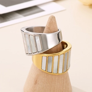 Minimalist wide band steel rings with shell inlay in gold and silver finishes