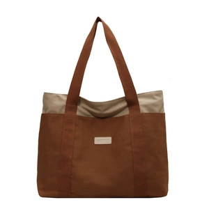 Canvas tote bag with brown and beige patchwork design for women's daily commute