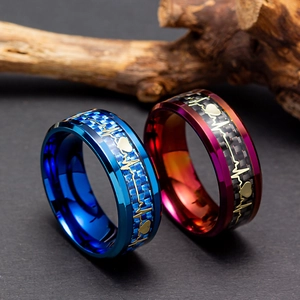 8mm carbon fiber rings with gold EKG heartbeat pattern in blue and purple finishes