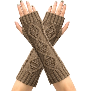 Close-up of brown knit fingerless gloves with diamond patterns and ribbed cuffs