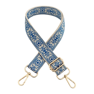 Close-up of 3.8cm wide jacquard bag strap with blue ethnic pattern and gold metal hooks