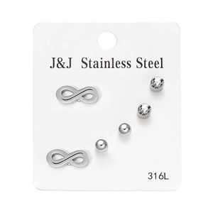 Detail of 3 pairs of 316L stainless steel studs including infinity, crystal and ball designs