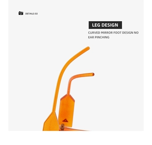 Detail of orange cat-eye sunglasses featuring curved temple tips for comfortable wearing