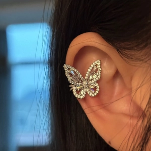 Sparkling zircon butterfly ear cuff for non-pierced ears, elegant jewelry detail view