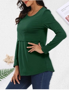 Side view of dark green cotton nursing top with double-layer design for breastfeeding